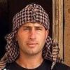 قوات الاحتلال تعتقل والدة الشهيد أشرف هلسة واثنين من أشقائه